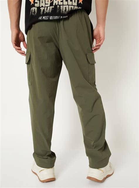 Buy Men Solid Cargo Track Pants Online at just Rs. 1199.0 ...