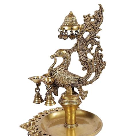 Buy Two Moustaches Brass Peacock Design Oil Diya Held by 3 Ladies ...