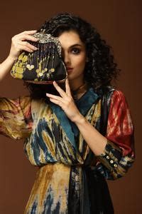 Buy Black Beads Tie And Dye Clutch by Capisvirleo Online at Aza Fashions.