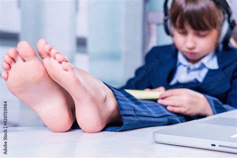Barefoot Child Using Computer 的图像结果