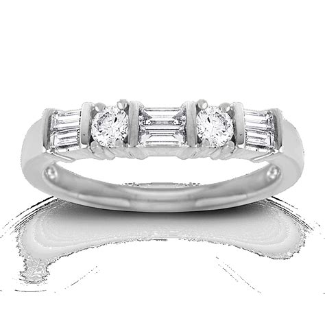 Round and Baguette Diamond Wedding Band in Platinum | Shane Co.