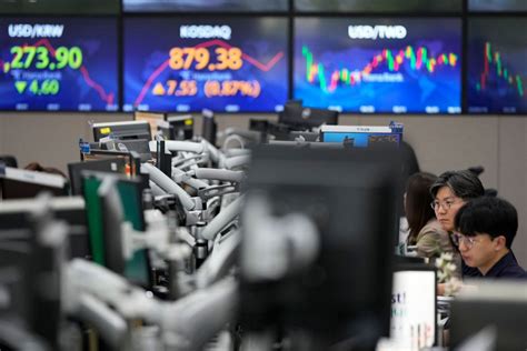 https://s7d2.scene7.com/is/image/TWCNews/South_Korea_Financial_Markets_89634