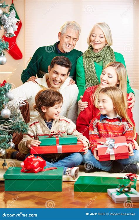 Family Celebrating Christmas with Gifts Stock Image - Image of family ...