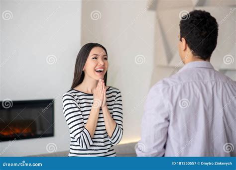 Man Standing with His Back Opposite a Joyful Woman. Stock Image - Image ...