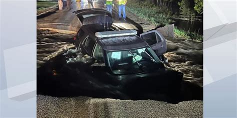 Deputy, 2 K-9s escape from washed-out road