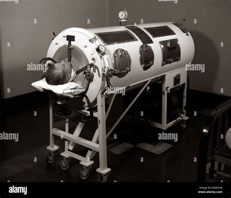1930s 1940s 1950s MAN LYING IN IRON LUNG NEGATIVE PRESSURE VENTILATOR ...