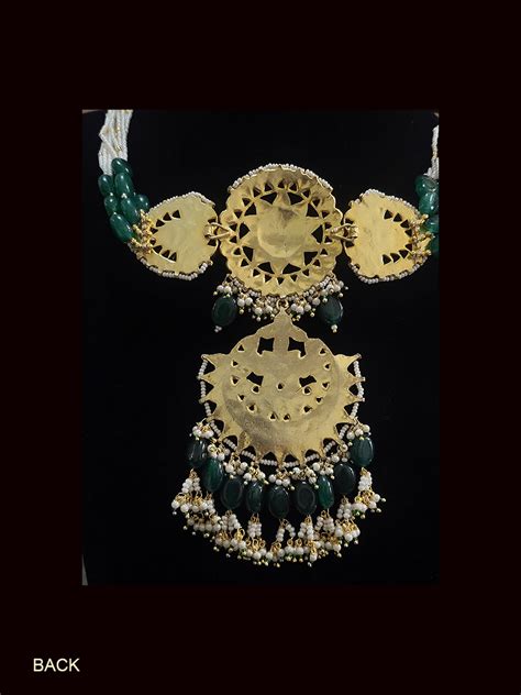 Circular center paachi kundan long center piece choker set with green ...