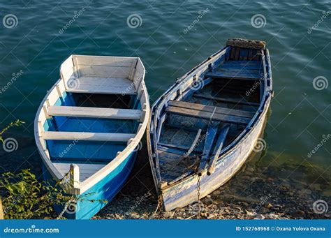 Two boats in clear lake stock photo. Image of beautiful - 152768968