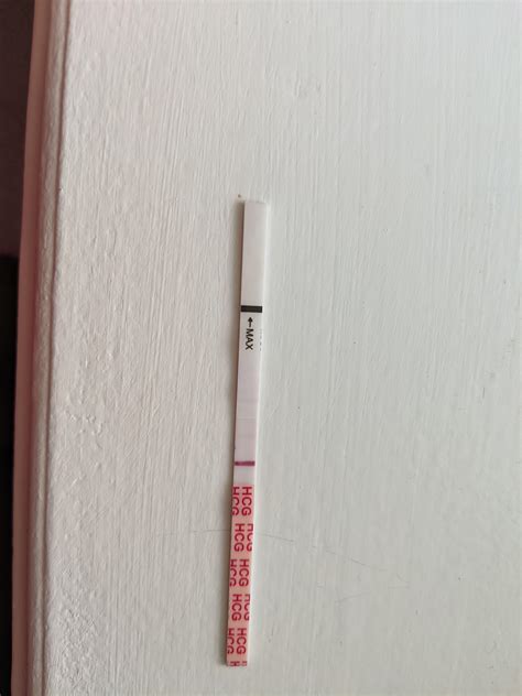 Wondfo pregnancy test 14 DPO, supposed to get my period today. Not FMU ...