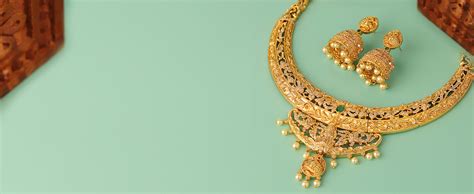 VOYLLA Abharan Green and Red Stones Gold Plated Jewellery Set : Amazon ...