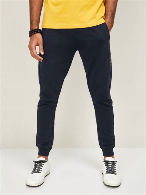 FAME FOREVER Solid Men Blue Track Pants - Buy FAME FOREVER Solid Men ...