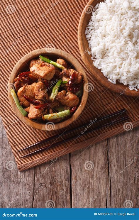 Kung Pao Chicken in a Bowl and Rice. Vertical Top View Stock Image ...