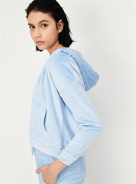 Buy Women Solid Hooded Sweatshirt Online at just Rs. 999.0 ...