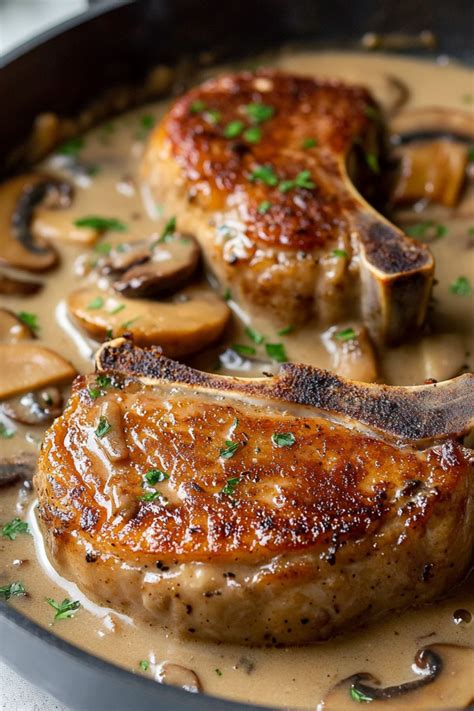 Smothered Pork Chops with Mushroom Gravy - Insanely Good