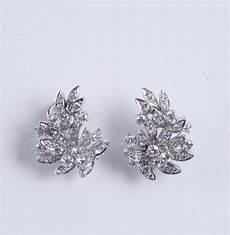 orecchini fiore orecchini con diamanti a forma di fiore argenti e orecchini fiore orecchini con diamanti a forma di fiore argenti e