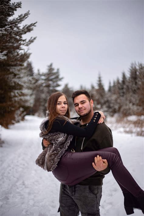 Download Couple Hugging In Bridal Carry Position At Winter Wallpaper ...