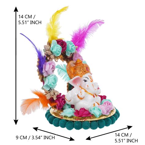 Lord Ganesha Idol With Flowers And Feathers Online - eCraftIndia Online