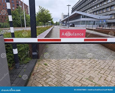 Direction Road Sign and Barrier for the Exit of Ambulances at the ...