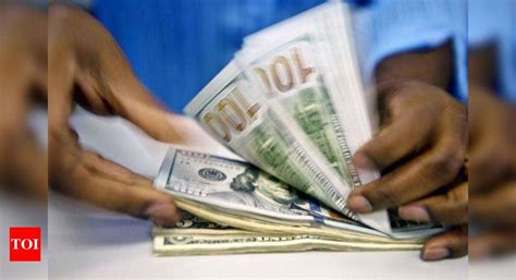 Rupee: Rupee in free fall, slides 21 paise to new 9-month low - Times ...