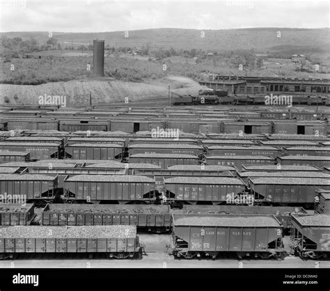 1930s 1940s RAILROAD YARD WITH ENGINE ROUNDHOUSE AND MANY BOXCARS AND ...