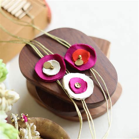 Buy Handmade Reusable Floral & Gold Accent Upcycled Fabric Rakhi With ...