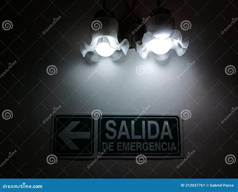 Emergency exit, in spanish stock image. Image of evacuation - 213037761
