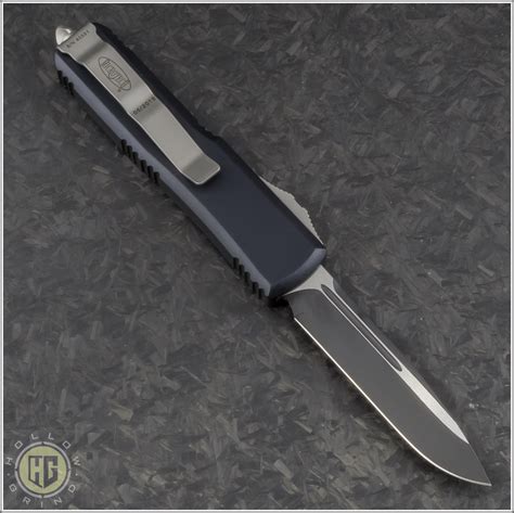 Microtech Knives UTX-85 S/E Automatic OTF D/A Knife (3in Black Plain ...