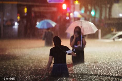 韩国中部地区暴雨致11死、8人失踪、982人受灾|韩国|暴雨|受损_新浪军事_新浪网
