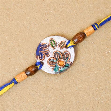 Buy Handmade Phool White Copper Enamel Rakhi With Chocolates & Roli ...