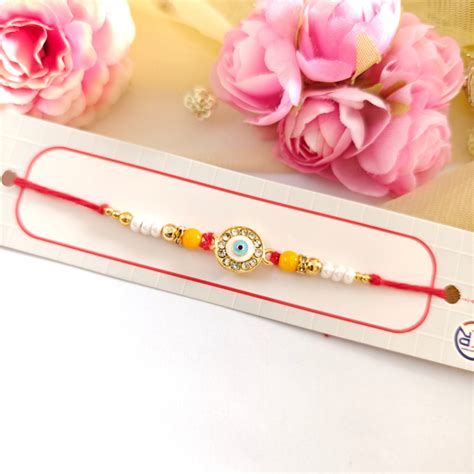 RAKHI - Nazar Battu (Evil Eye) Metal Charm Set of 1 (RK015) – Kalakariatoz