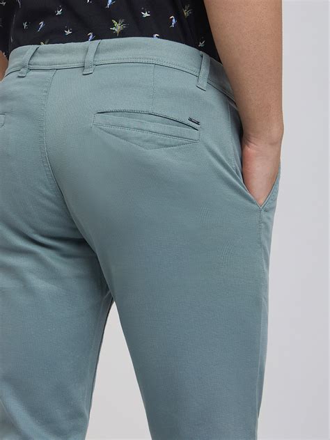 Men Green Low Rise Tapered Fit Solid Cotton Blend Trouser – MyRaymond