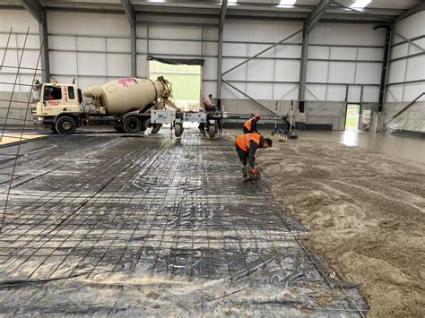 Industrial concrete flooring contractors install new warehouse floor ...