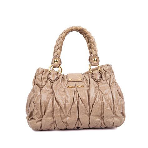 Buy Miu Miu Matelasse Leather Bauletto Aperto Bag from MIU MIU Online ...