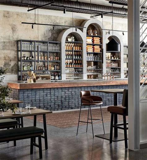 https://furnitureroots.com/wp-content/uploads/2020/07/Industrial-Bar-Counter-for-Industrial-Theme-Restaurant-768x836.jpeg
