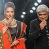 Shabana Azmi and Javed Akhtar gesture on the ramp as they showcase ...
