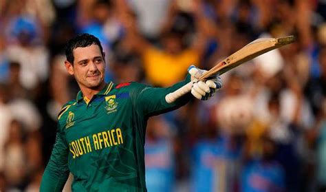 Quinton de Kock pointing bat towards crowd in celebration wearing South ...