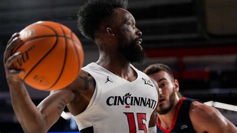 UC's Wes Miller, John Newman III, Jizzle James on Howard win