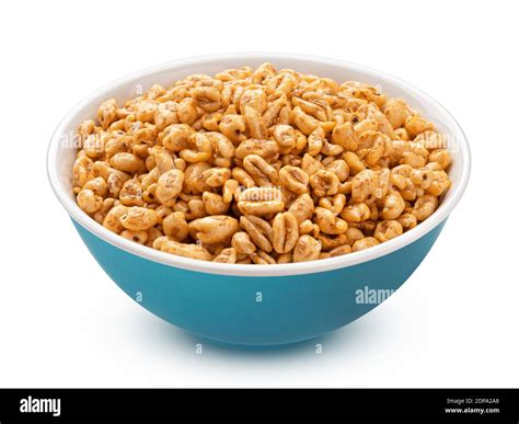 Puffed wheat cereal in bowl isolated on white background Stock Photo ...