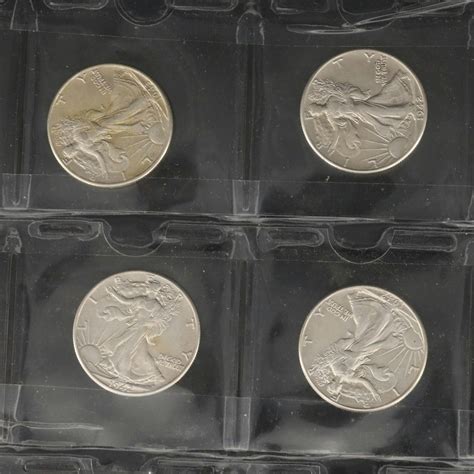 Group of Twenty Silver Walking Liberty Half Dollars | EBTH