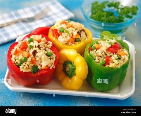 Stuffed peppers with rice and vegetables. Recipe available Stock Photo ...