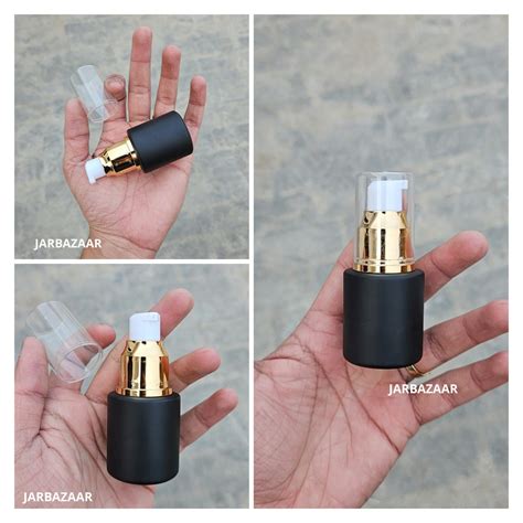 20 ML Black Flat Shoulder With Golden Pumps – JarBazaar