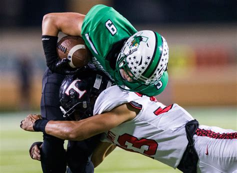 Photos: Southlake Carroll outlasts Euless Trinity (and the weather) in ...