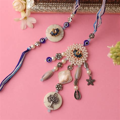Buy Handmade Lotus & Evil Eye Bhaiya Bhabhi Rakhi With Roli Chawal ...