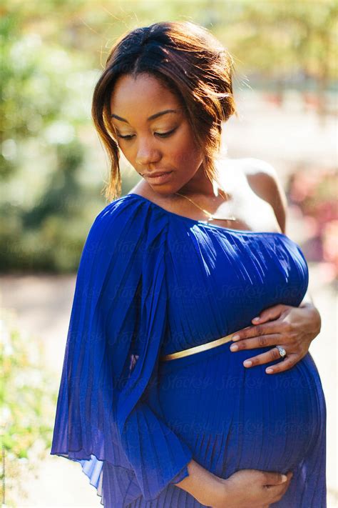 "Portrait Of A Beautiful Pregnant African American Woman" by Stocksy ...