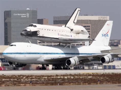 The Space Shuttle Endeavour, mounted atop NASA's modified Boeing 747 ...
