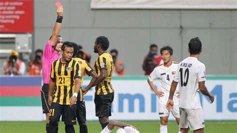 10-man Malaysia hold on for Suzuki Cup draw against Myanmar - ESPN