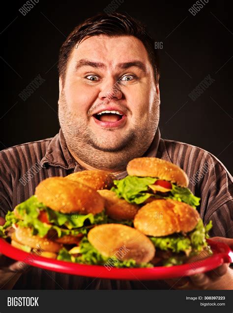 Fat Man Eats Burgers. Image & Photo (Free Trial) | Bigstock