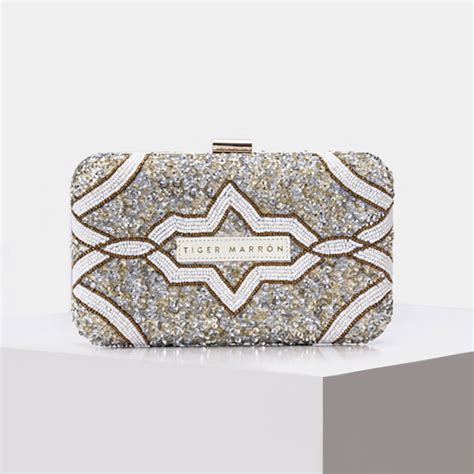 Buy Designer Leather Clutch Bags Online for women at Tiger Marrón