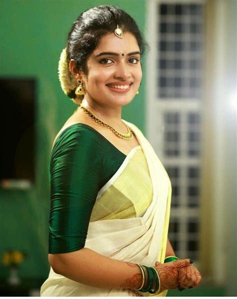 Pin by Aswany Mohan on Engagement look | Kerala saree blouse designs ...