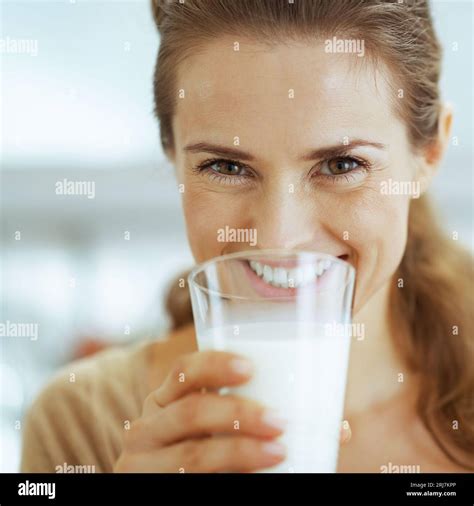 Woman eating milky almond hi-res stock photography and images - Alamy